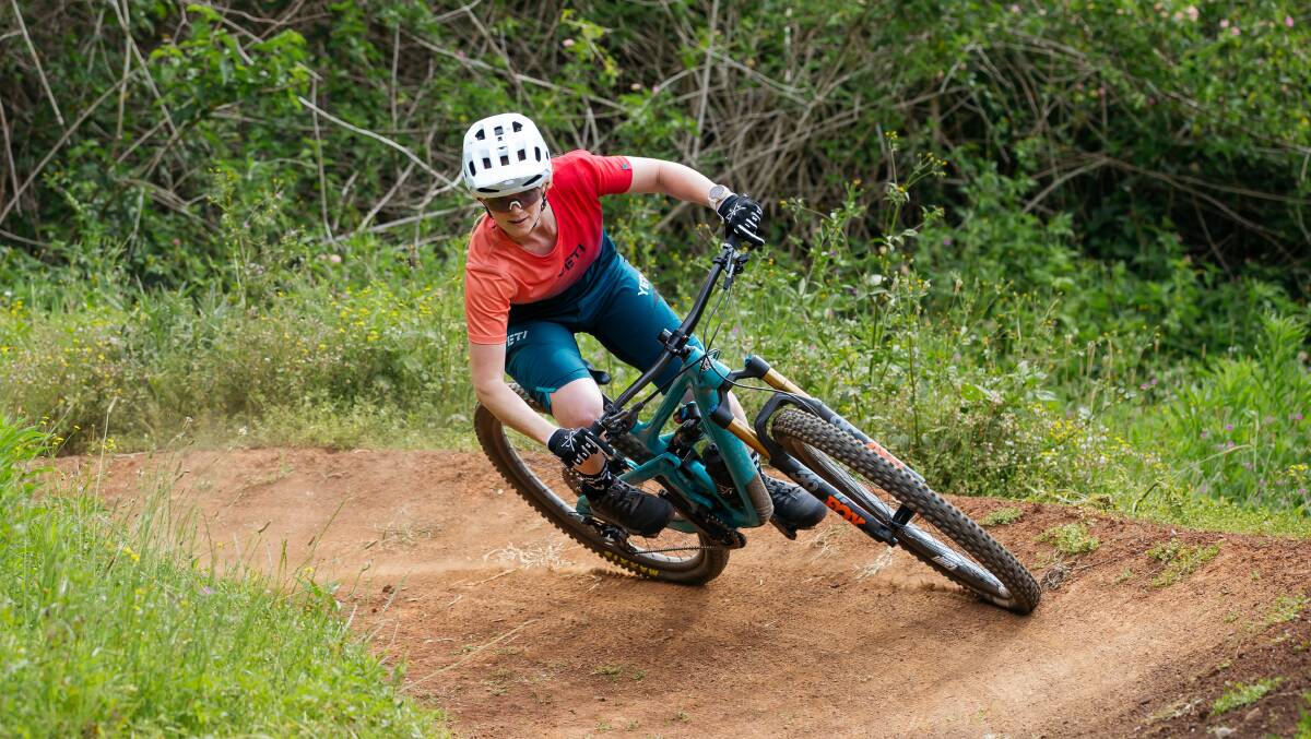 TEST RUN: Well known enduro racer and BMX rider Leanna Curtis tries out Cringila Hills Recreation Park's mountain bike trails. Picture: Wesley Lonergan