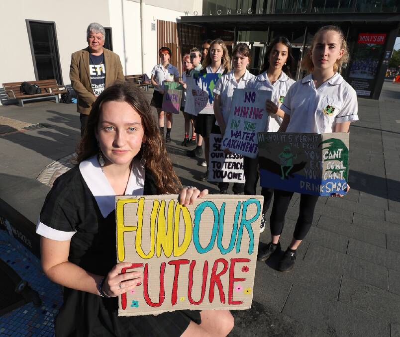 CLIMATE STANCE: Wollongong teenager Ella Lee (front) and South Coast Labour Council secretary Arthur Rorris with other students supporting the School Strike 4 Climate Australia day of action on September 25. Picture: Robert Peet