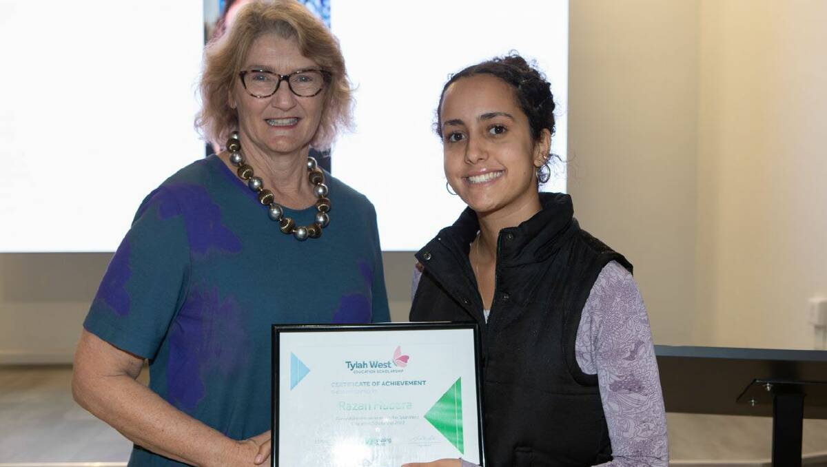 HAPPY: Housing Trust CEO Michele Adair with UOW student Razan Habara, who is ecstatic to receive a Tylah West Education Scholarship. Picture: Mark Newsham.