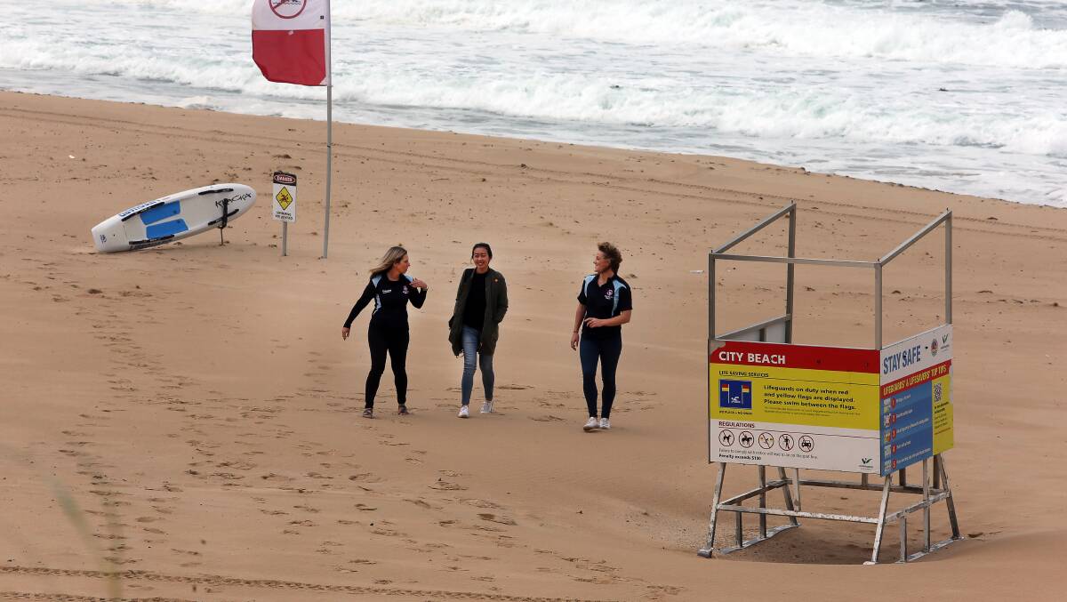 Donna Wishart, Phonethip Ophaso and Chloe Kerr at Wollongong City Beach for Surf Life Saving NSW's multicultural beach safety workshop. Picture: Robert Peet