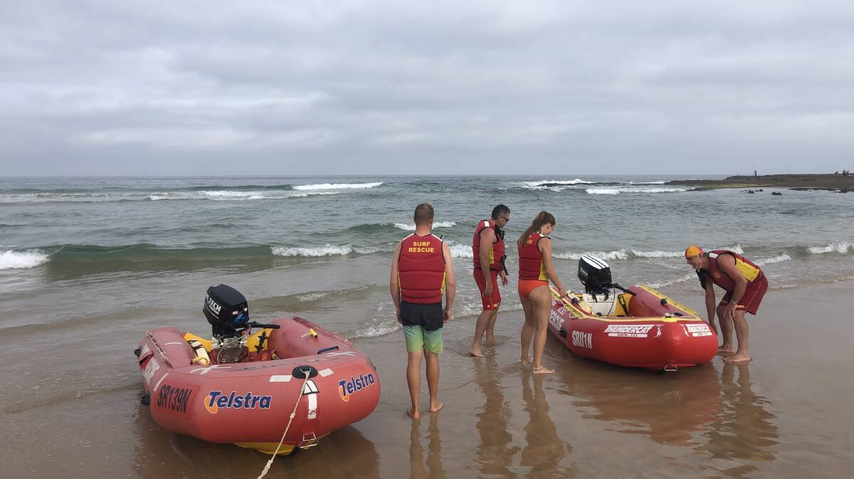 Bulli and Woonona lifesavers saved one man from almost drowning, and three other people caught in a rip near Bulli Beach. Picture: Anthony Turner
