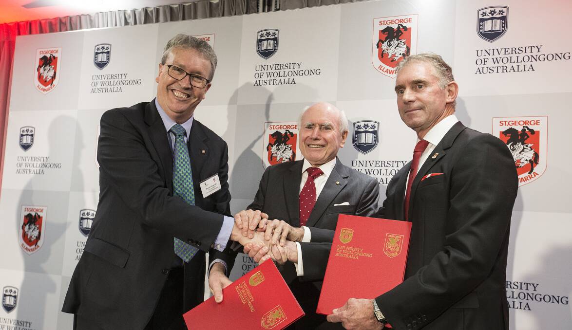 SEALED: University of Wollongong vice chancellor Professor Paul Wellings, former Prime Minister John Howard and St George Illawarra chairman Brian Johnston.