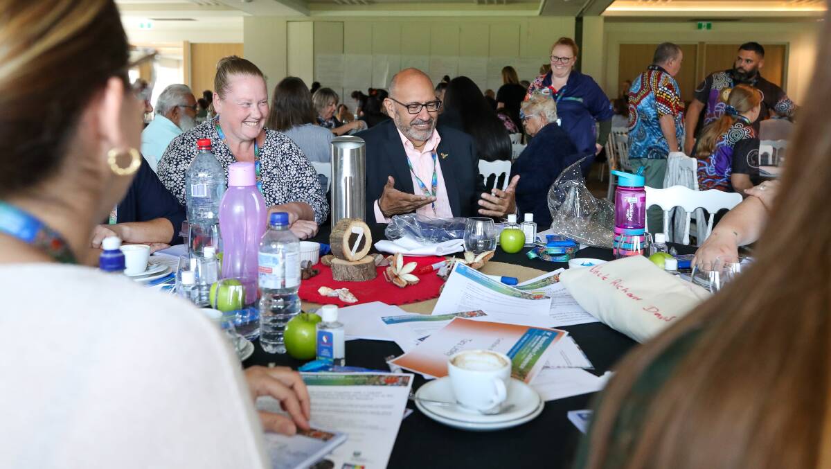 EVENT: Richard Weston, NSW's Deputy Children's Guardian for Aboriginal Children and Young People speaking with people at a table during the Reconciliation Conference at The Grange Golf Club on Thursday, April 29. Picture: Adam McLean.