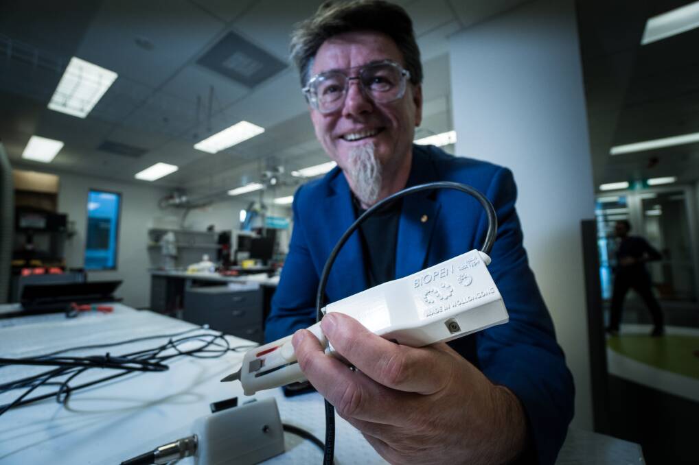 AWARD FINALIST: University of Wollongong ACES director Professor Gordon Wallace shows off the innovative BioPen. Picture: Paul Jones