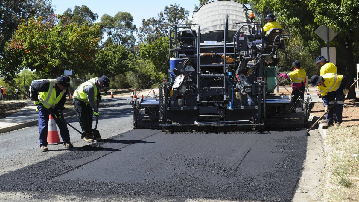 An asphalt mix using recycled toner cartridge contents is trialled in the ACT in 2016. Picture: Graham Tidy.