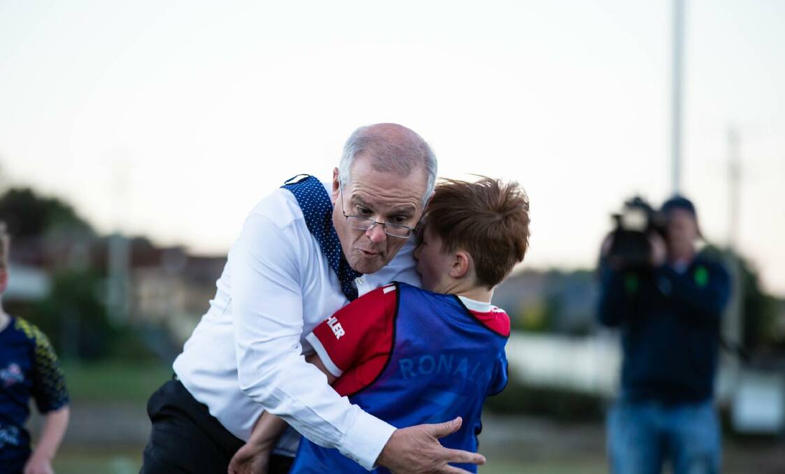 Scott Morrison has crashed into a young player while playing soccer in Devonport, Tasmania.