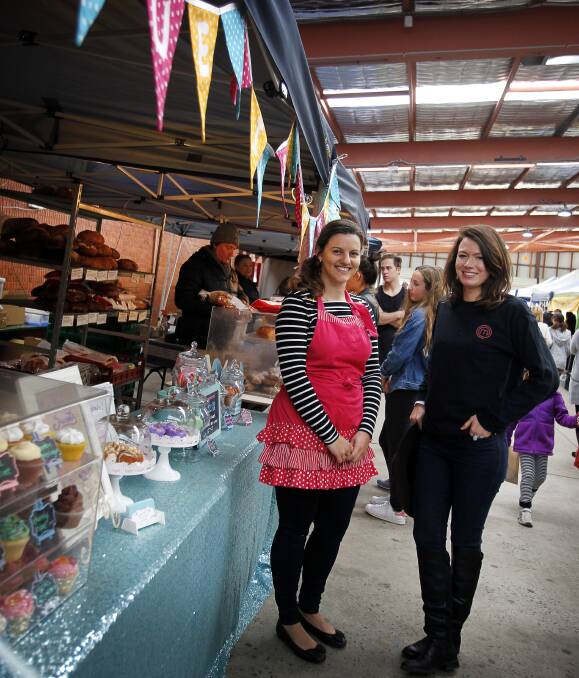 FRESH TALENT: MasterChef casting producer Jess Dudley (right) chats with Blue Bird Sweet's stallholder Rachel Golding during a visit to Bulli Forager's Market on Sunday to seach for potential contestants. Picture: Sylvia Liber