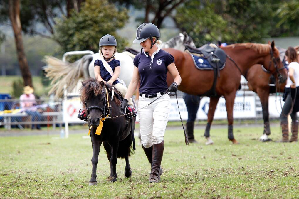 Alisa Bateman with daughter Addie on Pepper, the Shetland Pony after competing in the Show Jump. Picture: Sylvia Liber