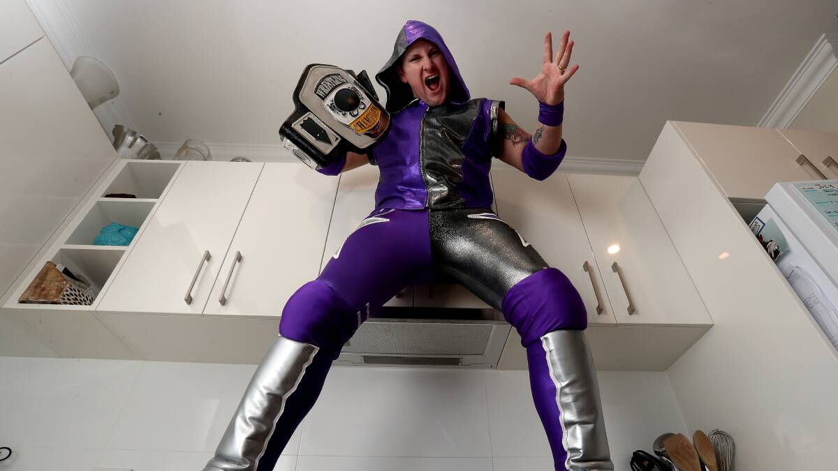 PERFORMING: Helensburgh resident Cameron Keep, aka Johnny Starr, juggles family and work as a police officer with being a pro-wrestler. He'll appear at an upcoming show in the Illawarra. Picture: Robert Peet