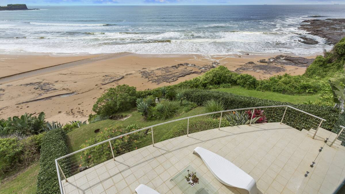 High-end remains strong as Kiama beachfront home fetches $4m-plus at auction