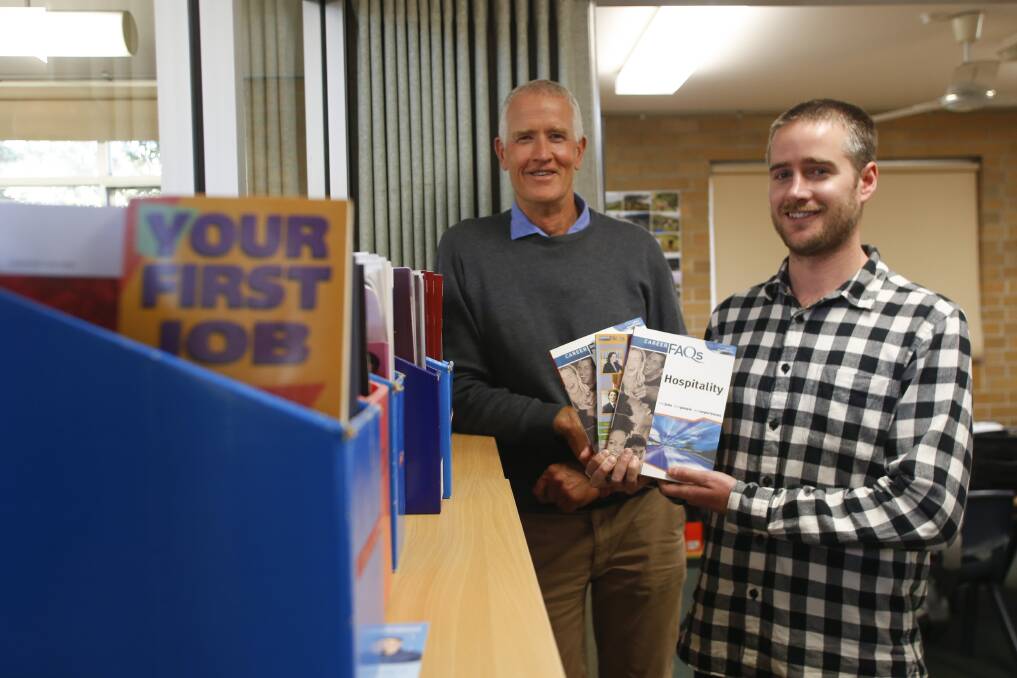CAREER PATHS: Simon King, careers advisor at Illawarra Sports High and Paul Davis, program co-ordinator at The Smith Family's Learning for Life program on Thursday. Picture: Anna Warr