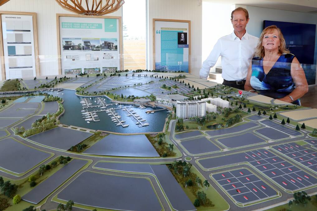 PLANNING: Frasers' Glenn Colquhoun and Mayor Marianne Saliba pictured last year with a model showing the then proposed changes to the Shell Cove development. Picture: Sylvia Liber