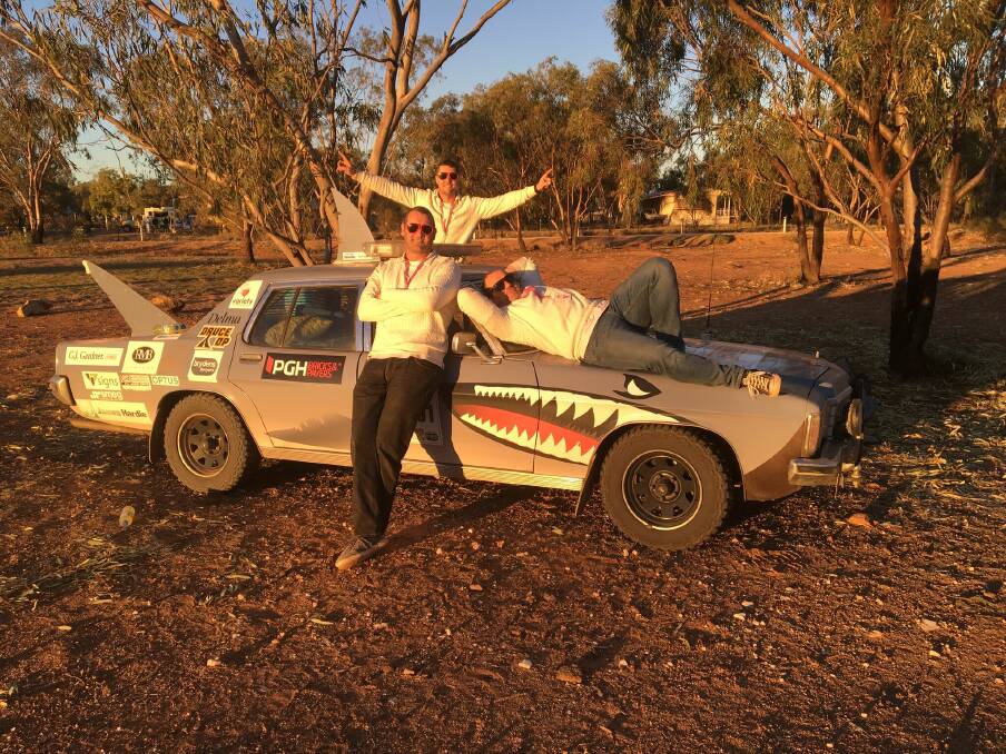 FUNDRAISING: Sean Vickery, Nathan Fay and Horst Lueckl with 'Delma' the shark car. Picture: Supplied