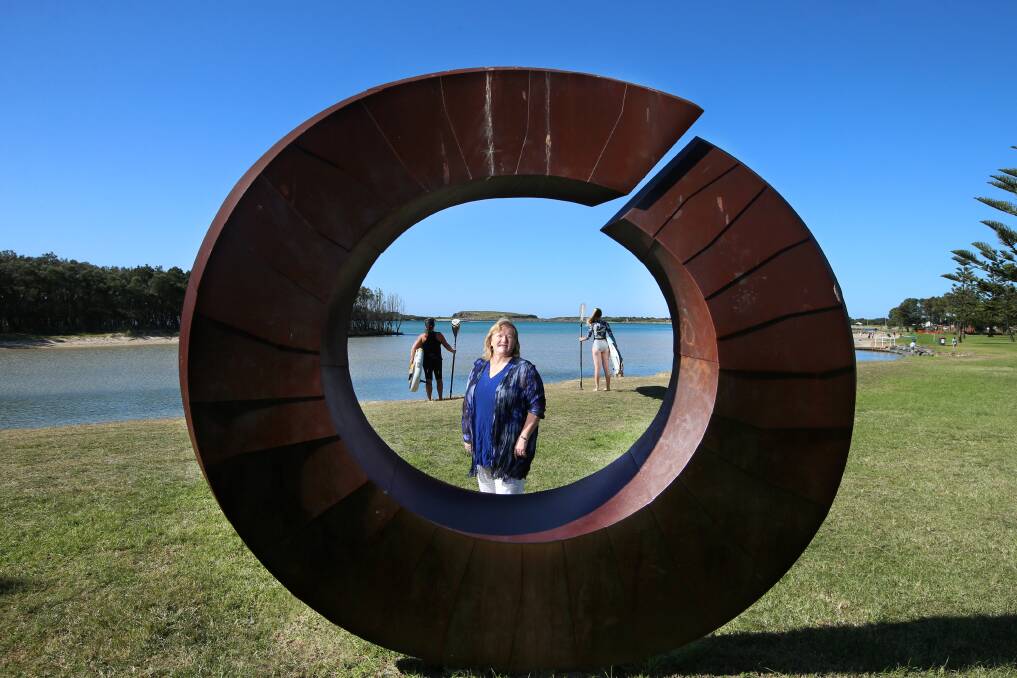 STRATEGY: Shellharbour Mayor Marianne Saliba at the 'Split' art piece by David Ball, a dramatic framing of Windang Island. Picture: Sylvia Liber