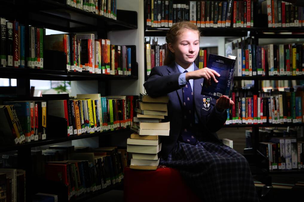 PROMOTING READING: Jasmine Sim, a year 7 student at The Illawarra Grammar School and popular blogger, at the MS Readathon launch on Thursday. Picture: Sylvia Liber