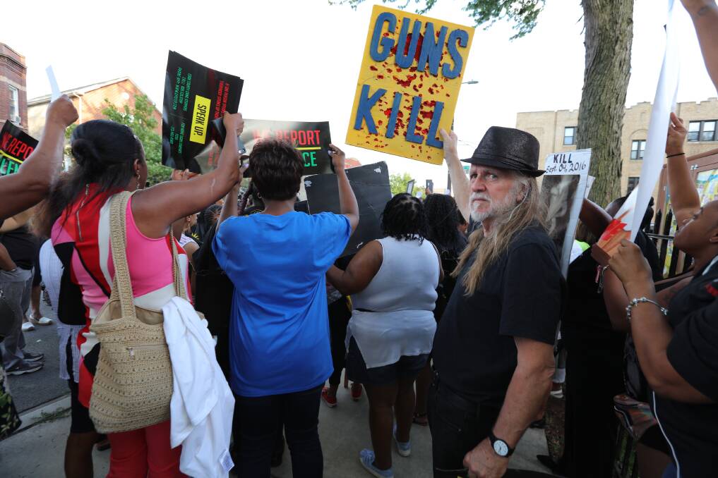 Werri Beach film-maker, artist and humanitarian George Gittoes at a rally in South Side, Chicago. Picture: Supplied