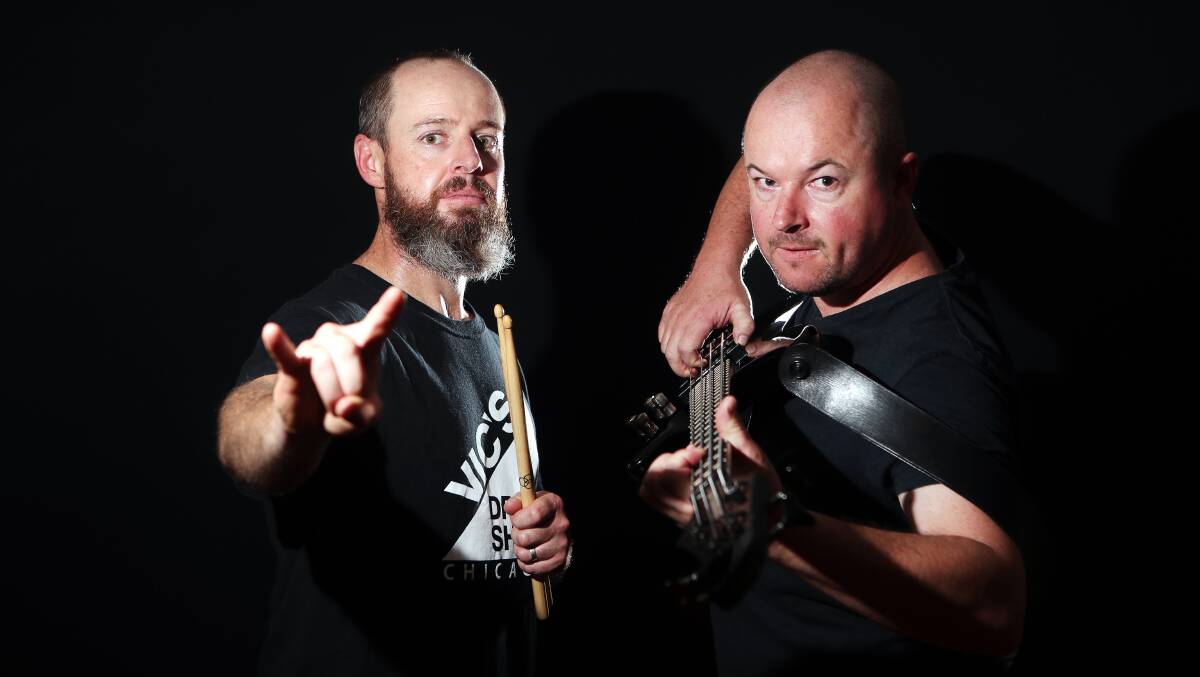RECONNECTED: Brothers Steve and Rob Giles are one half of Illawarra metal band Carbon Black. The band will perform at Rad Bar, Wollongong on December 7. Picture: Sylvia Liber