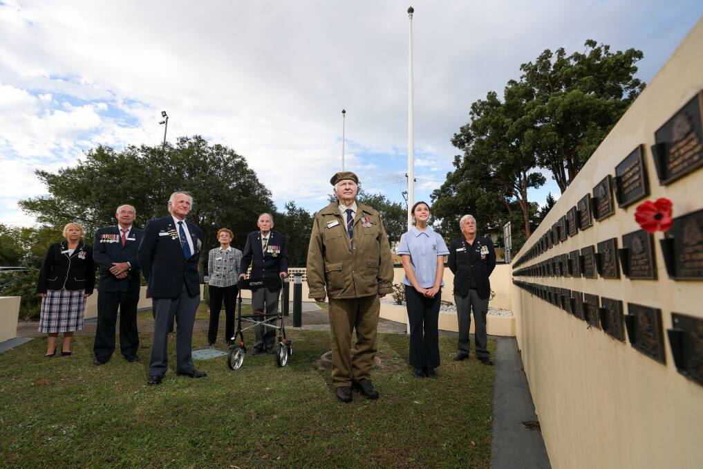 (Left to right) Deborah Hamilton, Phil Bourke, Hans Hornig, Dorothy Dean, Bill Dean, Col Potts, Isabelle Plattner and Wayne Burgess at Albion Park RSL ahead of the Anzac Day events. Picture: Adam McLean