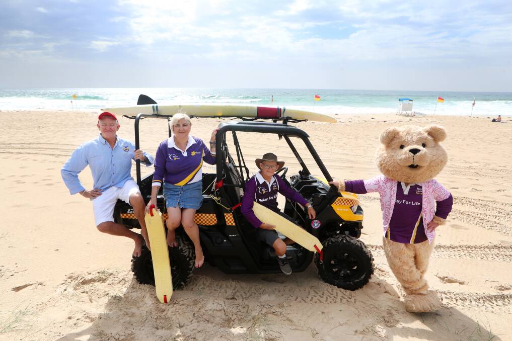 EVENT: Wayne Cavanagh, president of Shellharbour Surf Life Saving Club with Sam Jones, Tony Purdon and mascot Dougal. Picture: Sylvia Liber