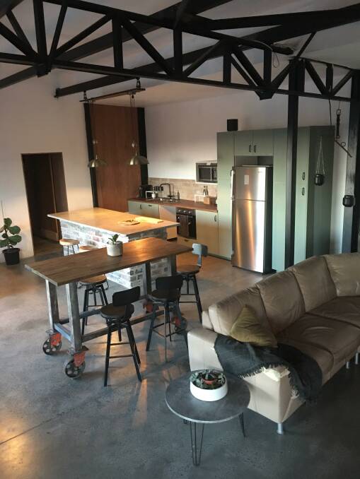 PROJECT: The Lake Heights property featured a large industrial shed. which has since been converted into a New York industrial-style studio apartment. Picture: Supplied