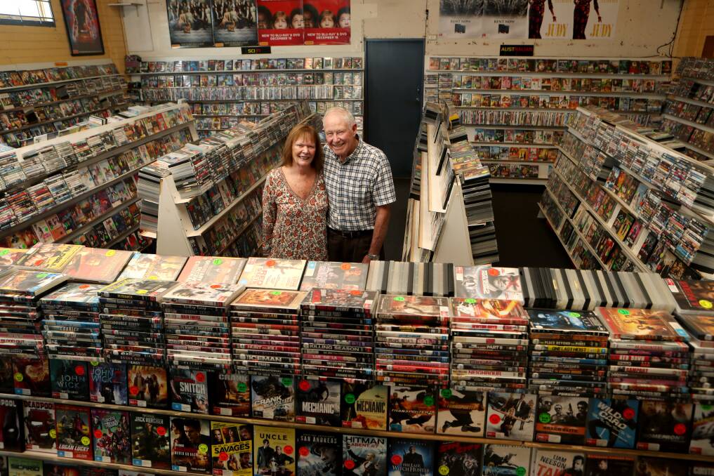 POPULAR BUSINESS: Long-time Leading Edge Video Thirroul owners John and Marion Wallace. They've owned a video shop in the suburb since the early 1980s. Picture: Sylvia Liber