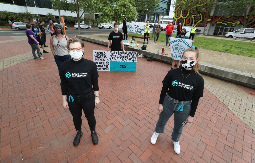 CALL FOR ACTION: (Left to right) Maneesha Todd and Imogen Todd during the protest in Wollongong on Friday. Picture: Robert Peet