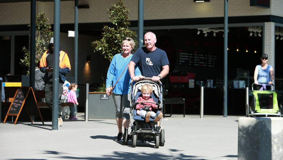 Chris Lovatt with wife Ruth and grandson Charlie. They've lived in Shell Cove on-and-off for 20 years, and recently returned there. Picture: Sylvia Liber