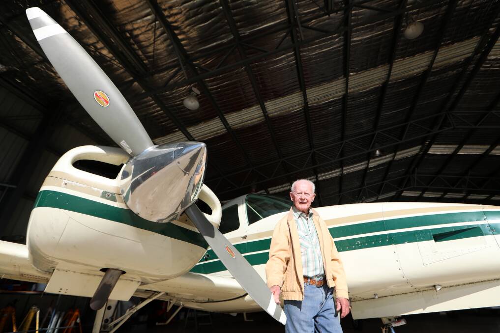 TAKING FLIGHT: Now 93 and living at the Warrigal facility at Mount Warrigal, Arthur Badger (pictured at the Illawarra Regional Airport) is still enjoying taking to the skies as a co-pilot. Picture: Sylvia Liber