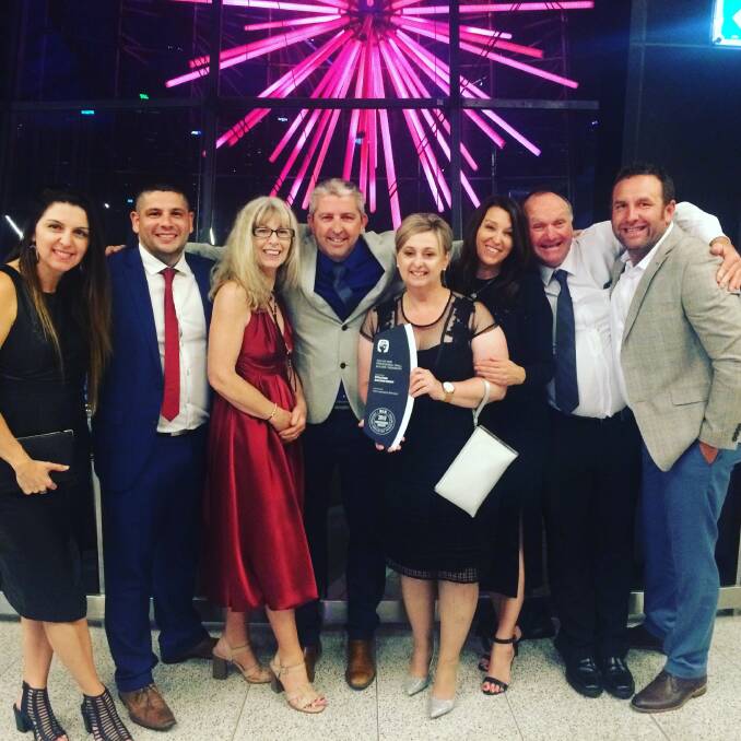 Dapto-based Evolution Building Group celebrating their award win in Sydney last weekend. Picture: Supplied
