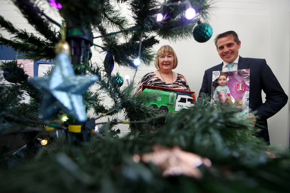 CHRISTMAS APPEAL: Member for Keira Ryan Park with Judy Hunt at Friday's launch of the toy drive. Picture: Sylvia Liber