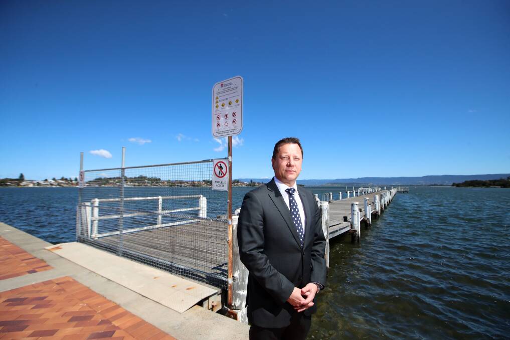 KEY ISSUE: Wollongong MP Paul Scully, pictured at a closed off jetty at Warrawong, claims the NSW Government has refused to publicly release a report on the condition and repair of Lake Illawarra jetties. Picture: Sylvia Liber