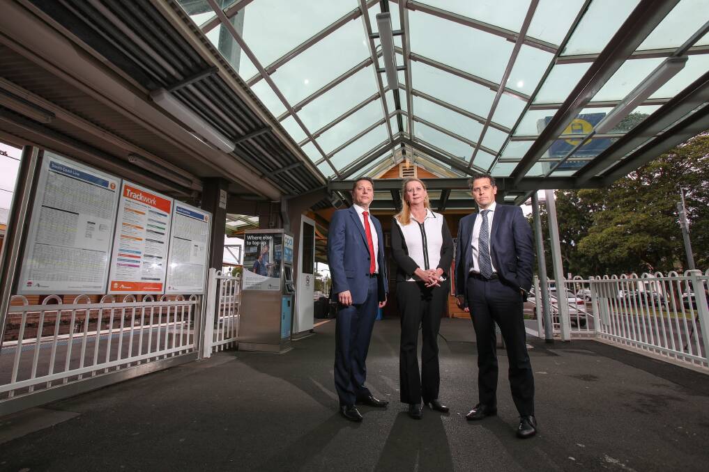 KEY ISSUE: Labor MPs Paul Scully, Sharon Bird and Ryan Park at Thirroul train station on Monday. They are calling for action to be taken regarding the mobile phone reception problems on the South Coast Line. Picture: Adam McLean
