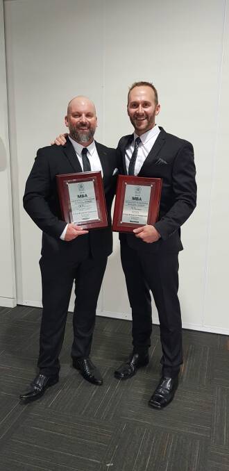 WINNERS ARE GRINNERS: A Class Building & Construction directors Robert Mitchell (left) and Scott Thompson at the awards presentation. Picture: Supplied