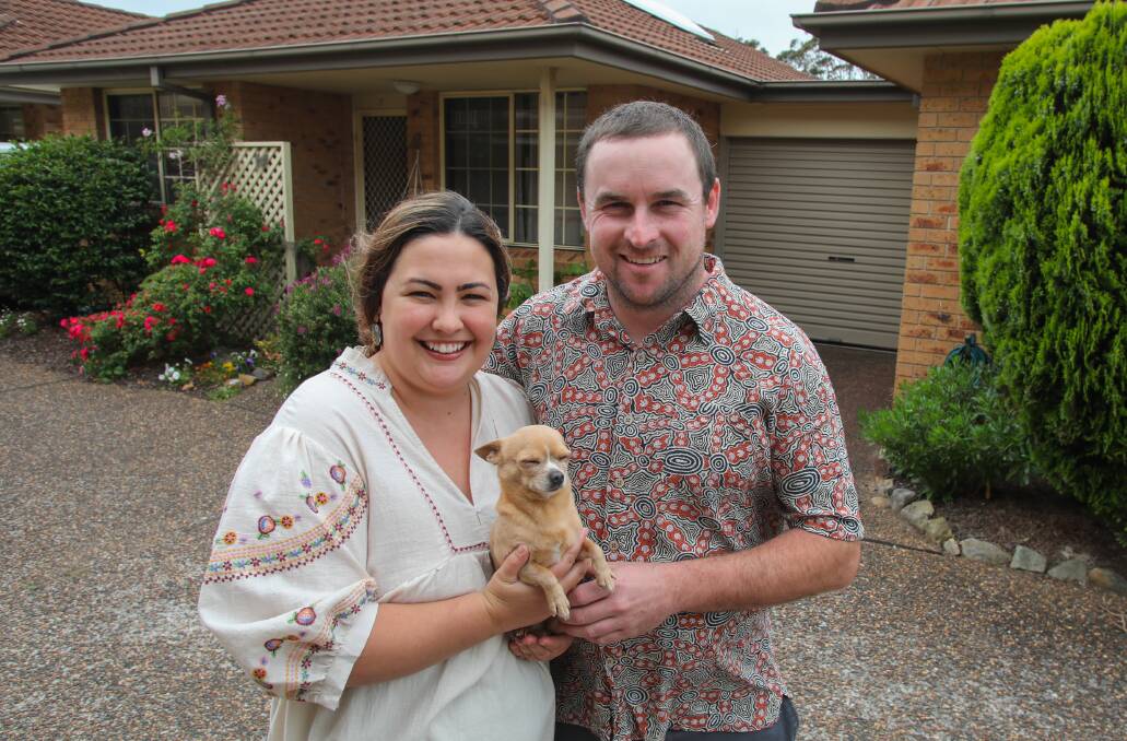 Helensburgh residents Kristy Mitchell and Dylan Ross with their dog Pablo. Picture: Wesley Lonergan