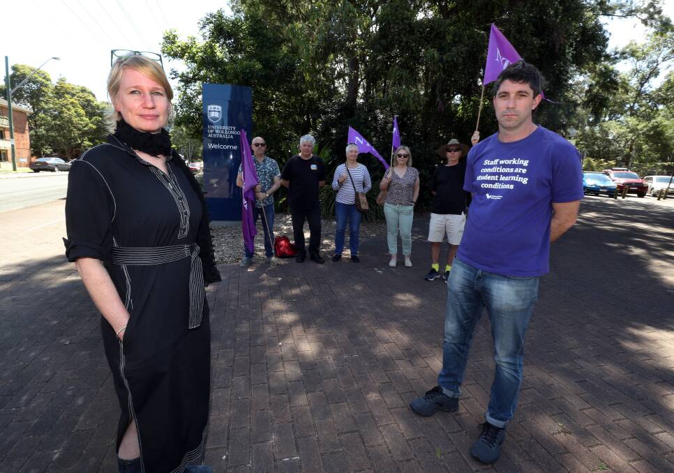 Professor Fiona Probyn-Rapsey and NTEU organiser Martin Cubby with union members outside the University of Wollongong on Wednesday. Picture: Robert Peet