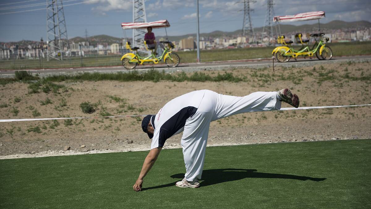 NEW SPORT: Battulga Gombo takes part in a net session at the Mongolian Friendship Cricket Ground in Ulaanbaatar in July 2016. Picture: Taylor Weidman/Getty Images
