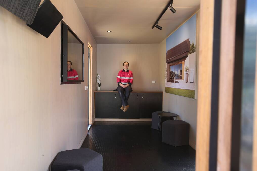 Laura Plocki from the Innovation Campus inspects the Tesla Tiny House. Do you have an interesting real estate story? Please email brendan.crabb@fairfaxmedia.com.au.  