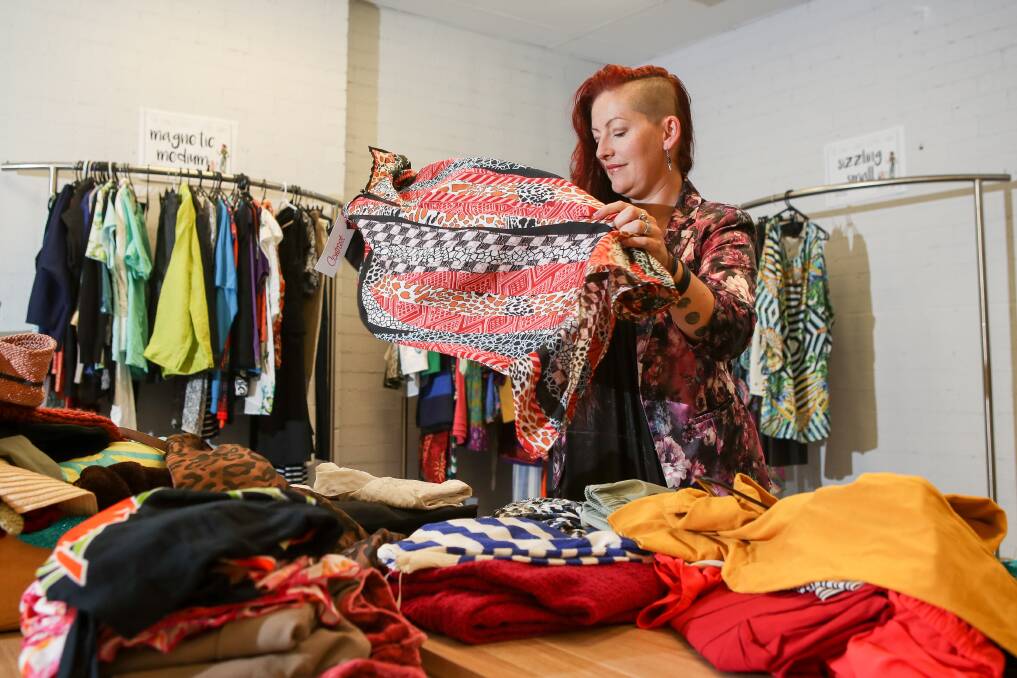 Preparation: The Gong's Great Clothes Swap organiser Shane Moon sorting clothes ahead of the swap meet in Wollongong this weekend. Picture: Adam McLean