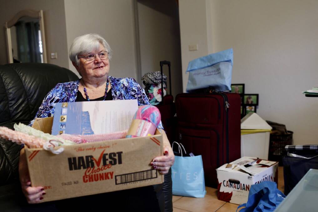 ACCOMMODATION: Housing Trust tenant Lyn Bailey packing on Thursday, ahead of a move into her newly secured property at Shellharbour. Picture: Supplied