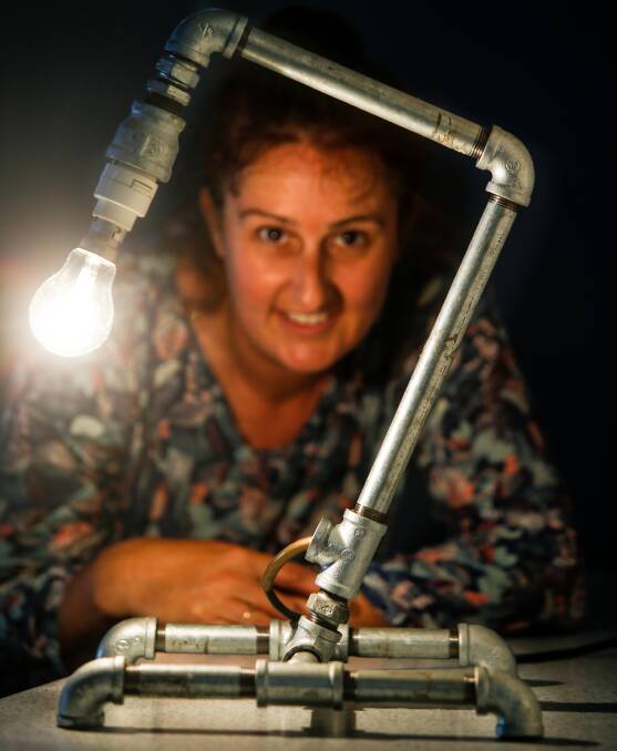 EXHIBITING: Penny Hoswell with a light stand she made for the show. Mrs Hoswell (née Creighton) won the Albion Park Showgirl Competition in 1992. Picture: Adam McLean