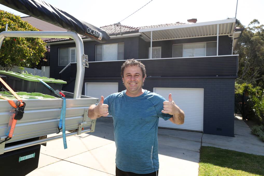 Costa Rippis at the front of his Unanderra house that he recently sold. Picture: Robert Peet