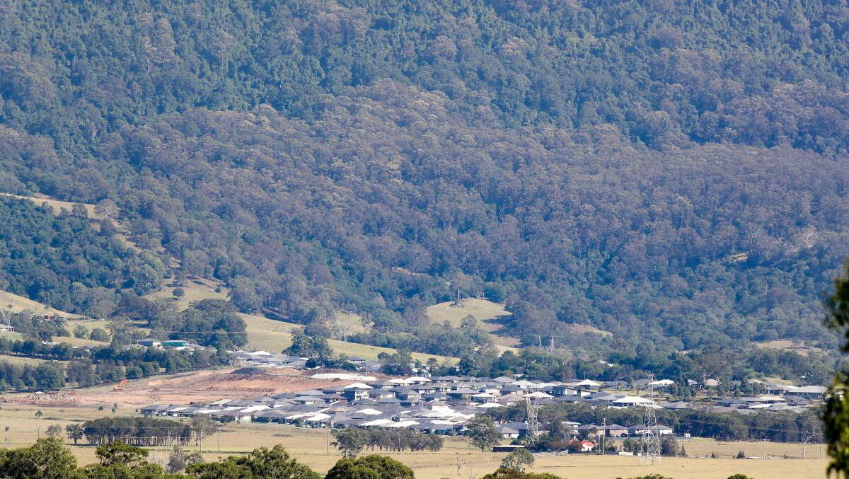 ISSUE: Council has been urged to reconsider a proposed 17 per cent increase in charges on new homes in West Dapto. Picture: Adam McLean