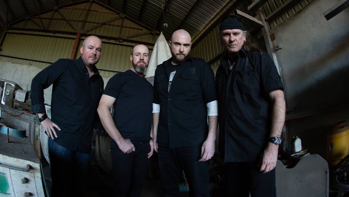 DEBUT ALBUM: Illawarra metallers Carbon Black (singer Jonathan Hurley pictured second from right) will release 'End of This' in September, and launch the album with a show in Wollongong. Picture: Britt Andrews