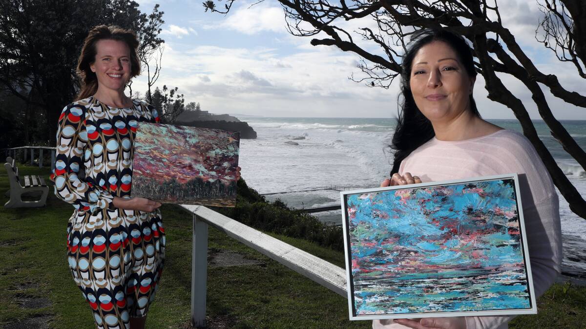 Susie Fagan (left) and artist Josephine Dash are part of a Facebook group encouraging creatives to display their works. Picture: Robert Peet
