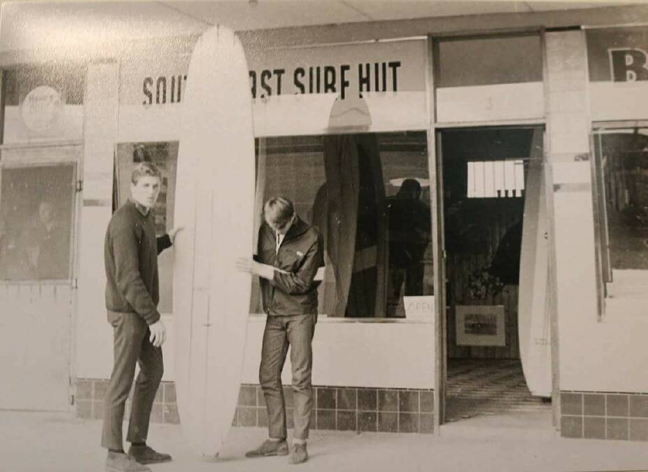 REMEMBERED: Darrell Eastlake (left) outside the 'South Coast Surf Hut'. Picture supplied by 'Lost Wollongong'. 