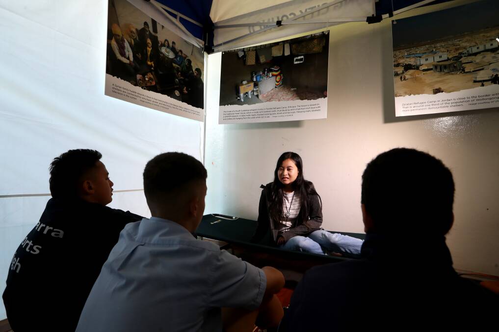 CHALLENGES: Students from Illawarra Sports High School took part in the Illawarra Refugee Challenge on Wednesday. Pictured addressing students is refugee Elizabeth Jowanie. Picture: Sylvia Liber