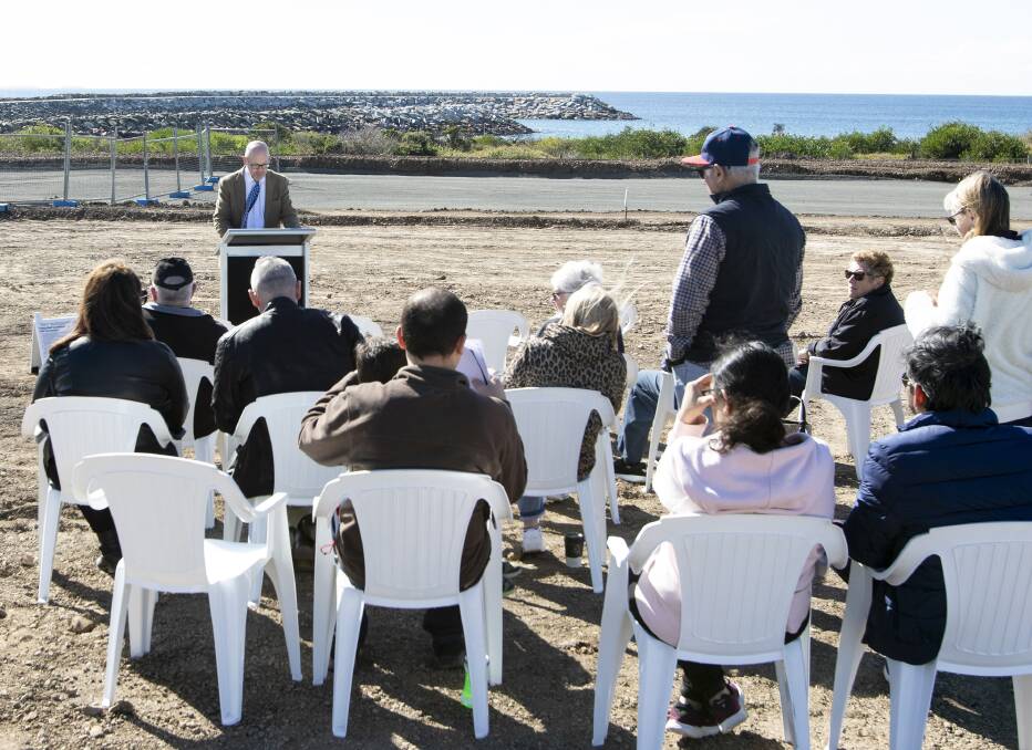 The on-site auction (pictured) hosted eight registered bidders, and according to developers saw the highest price paid for land at Shell Cove yet. Picture: Supplied