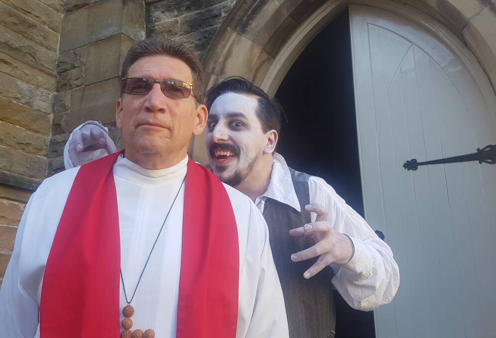 Reverend Geoffrey Flynn and actor Adam O'Brien.