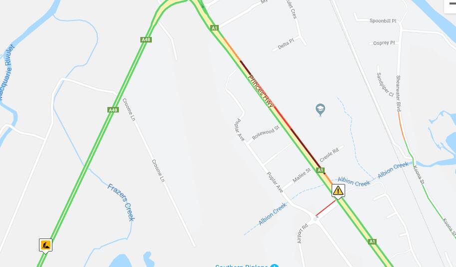 Traffic eases after three-car crash at Albion Park Rail
