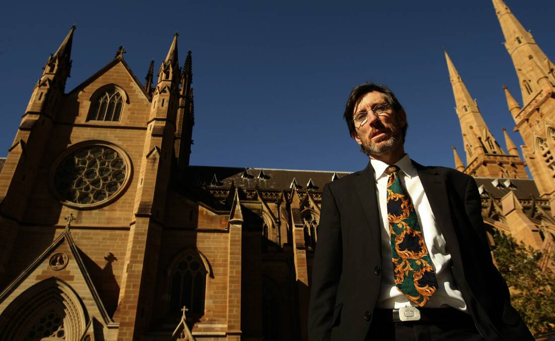 Survivor: Lawyer and child abuse survivor John Ellis outside St Mary's Cathedral in Sydney in 2010 while fighting the Catholic Church for justice. From January 1 survivors can sue all institutions after the NSW Government removed a legal roadblock against compensation.